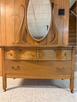Antique wooden dresser with mirror