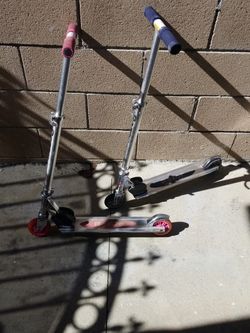 Pair Of Razor Scooters
