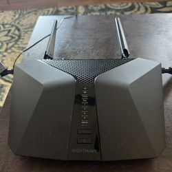 used NETGEAR Nighthawk RAX50 (AX5400) router with Wi-Fi Extender