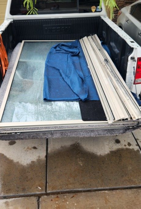 Double-Pane Sliding Glass Door is 8ft tall x8ft Wide