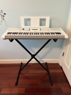 Yamaha EZ-300 61-Key Portable Keyboard with Stand