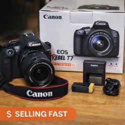Brand New Canon EOS Rebel T7 Kit DSLR Camera + Tripod 



