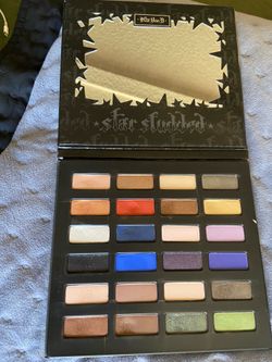 Kat Von D Star Studded Eyeshadow Book, a limited-edition, 24-shade makeup palette released for the 2014 holiday