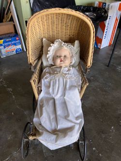 ANTIQUE BABY DOLL AND CARRIAGE