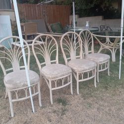 Table has Glass Top 4Chairs