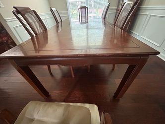Wood Dining Table with Cane Back Chairs