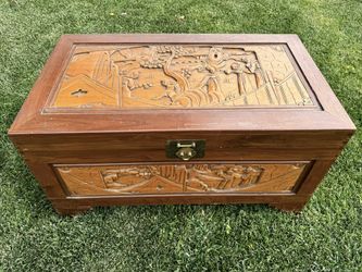 Well preserved Chinese camphorwood box, hand carved with pictures and text, brass fittings, insect proof.