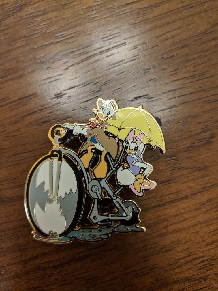Disney LE 250 pin Donald Duck and Daisy on bicycle