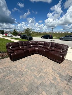 Cindy Crawford Leather Sectional Couch- delivery available