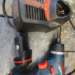 Drill, 2 Batteries And Charger 