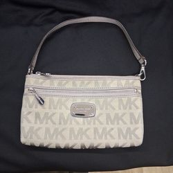 Mk silver wristlet