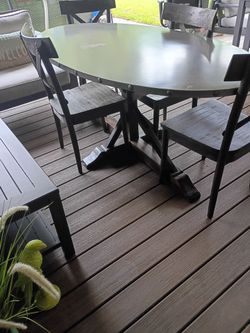Table 4 chairs 200 has stine on table