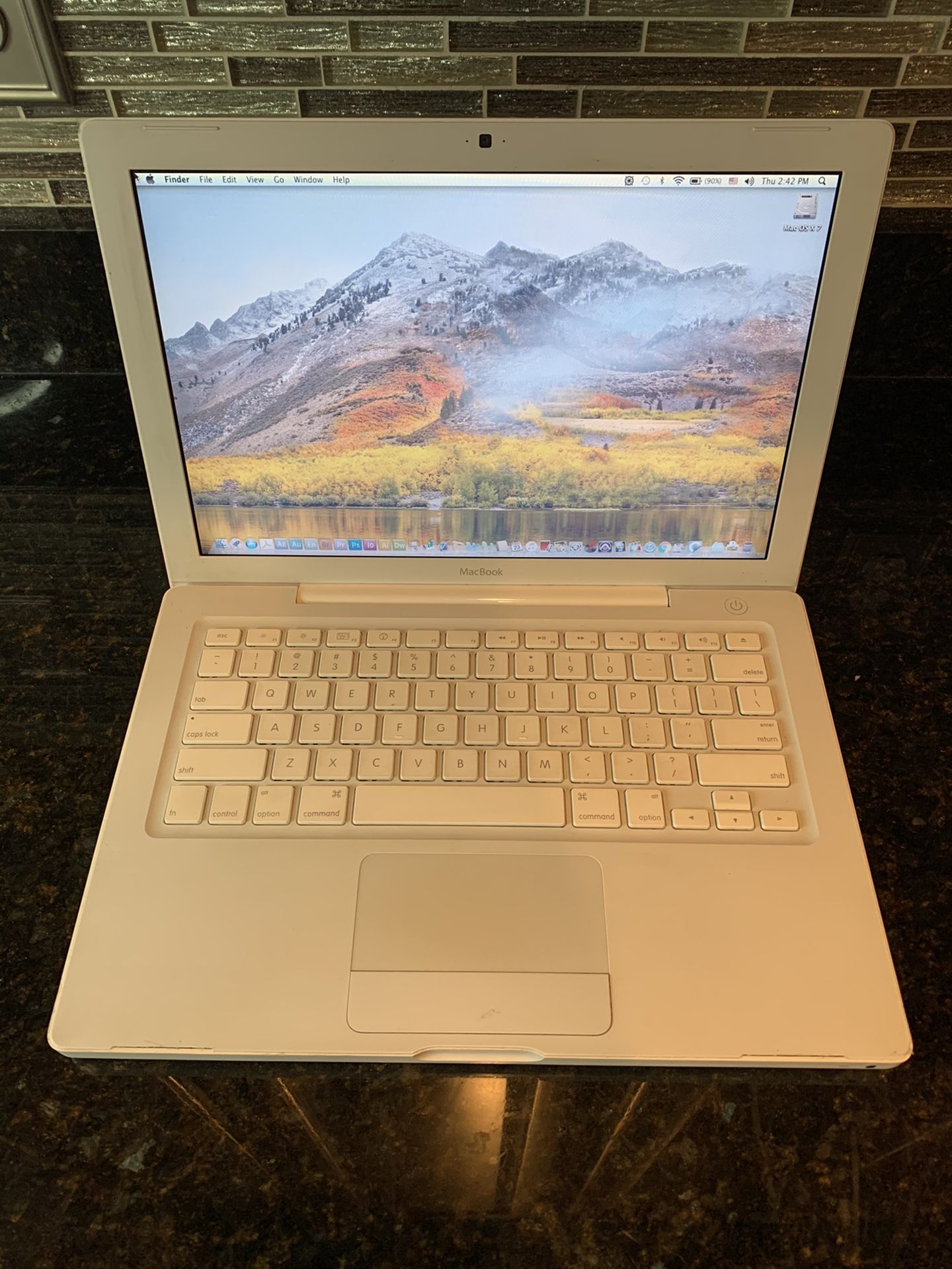 Apple MacBook 13" Laptop Runs Lion. Webcam, Microsoft Office, and a lot of Software
