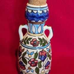 Very pretty hand-painted ceramic pitcher with floral motifs and cork stopper