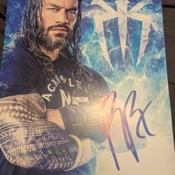 WWE Autographed  11x17 Roman Reigns 