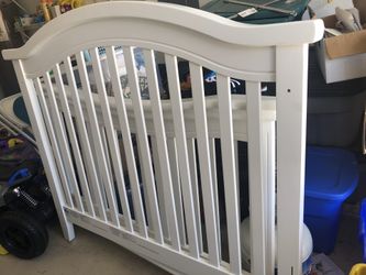 Baby crib with mattress