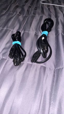 Two spare A/C cords with figure 8 adapter