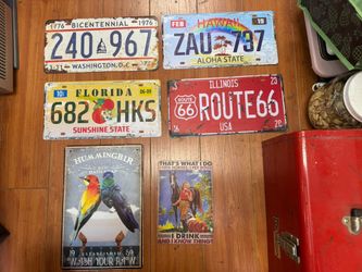vintage-style decorative tin signs and license plates