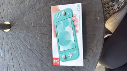 Brand New Turquoise Nintendo Switch Lite – Never Used