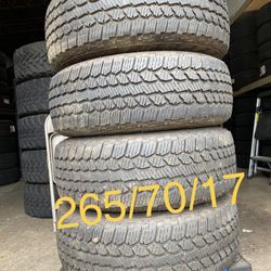 4) 265/70/17 Firestone Destination AT2 Tires  Tread measures 9-10/32  White and Black letter  Comes mounted in dodge ram wheels, the wheels are FREE. 