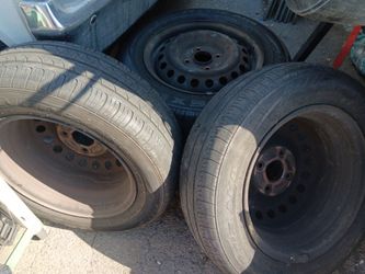 Honda 15" 4x114 wheels and tires steelies