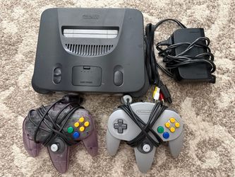 Nintendo 64 console with two controllers