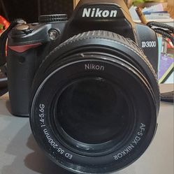 Nikon D3000  CAMERA AND EXTRA