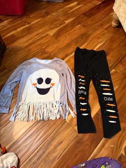Girl’s ghost fringe Halloween pants set. Fits like a 10/12