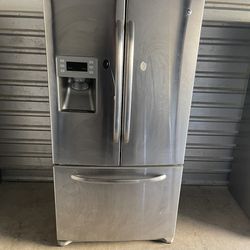 GE Stainless Steel Refrigerator And Freezer