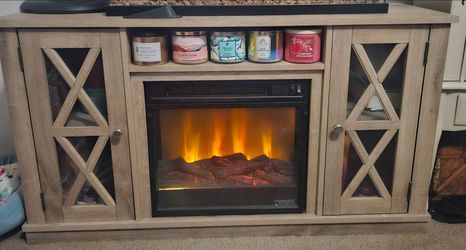 Electric fireplace with heat