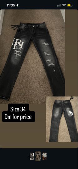 Amiri jeans staggers logo