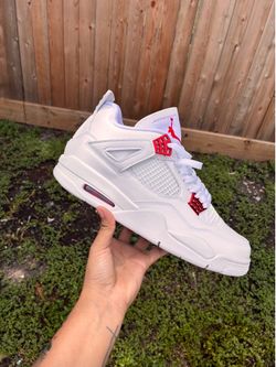 Red Metallic Jordan 4s