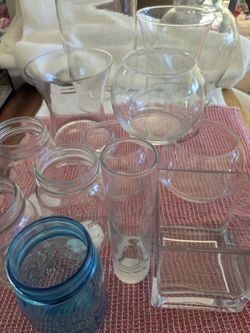 Glass vases: 13 varying shapes and sizes