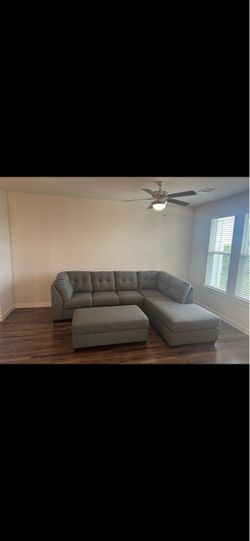 Sectional couch with ottoman