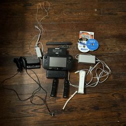 Wii U Console With Cords, Charging Dock, Remotes, And Games