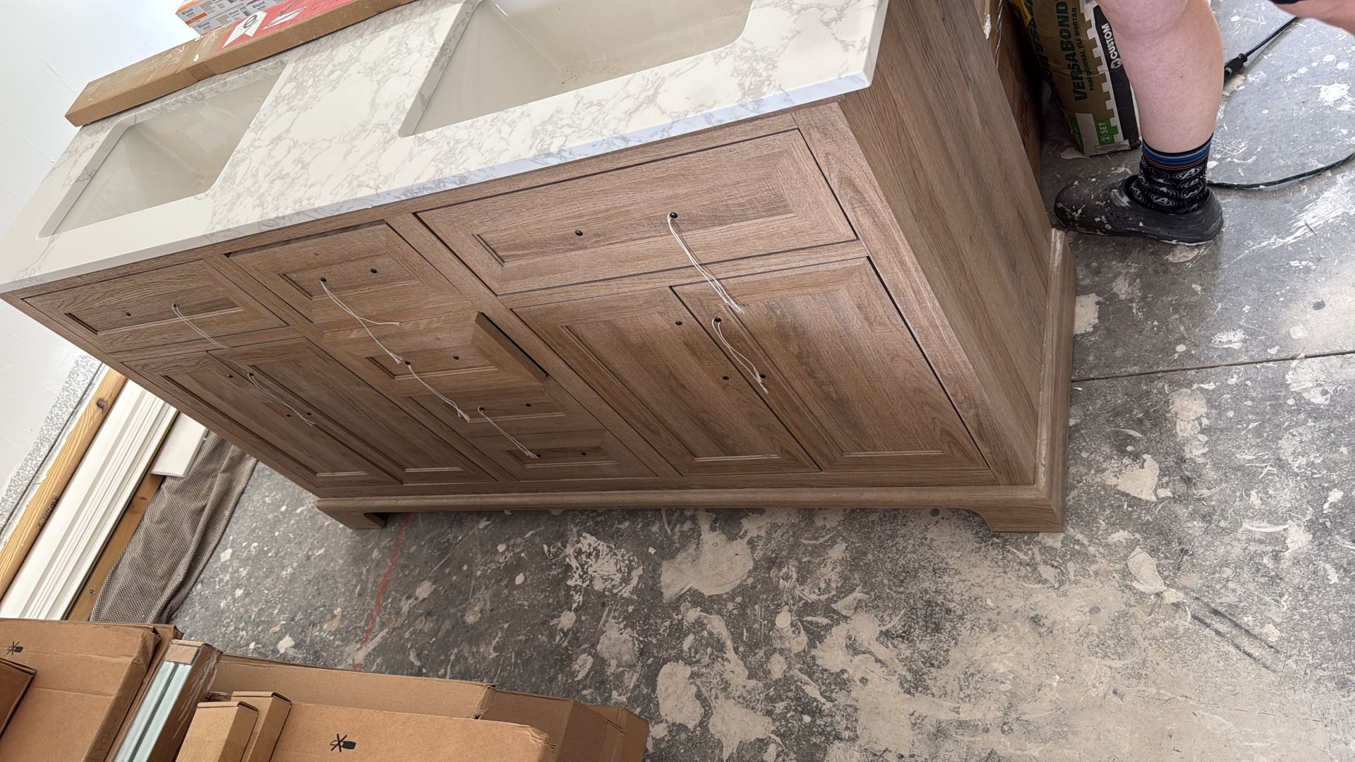 Ikea double bathroom cabinet, never used, includes granite stone, measures 60 x 19 inches