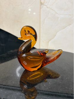 Amber glass duck figurine 4”