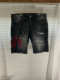 Black Amiri denim shorts “ rip patchwork “