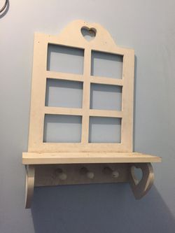 Wooden shelf, place for pictures