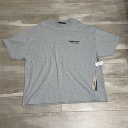 ESSENTIALS FEAR OF GOD “LIGHT HEATHER” TSHIRT