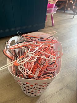basket, full of kids hangers?