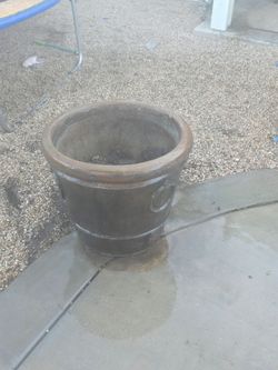 2 large concrete pots matching