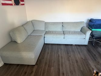 L-Shaped Sofa with Foldout Bed