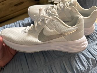 Women’s white Nikes