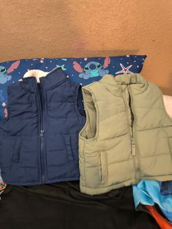 $10 EUC for both baby's vests size 12 and 18 months