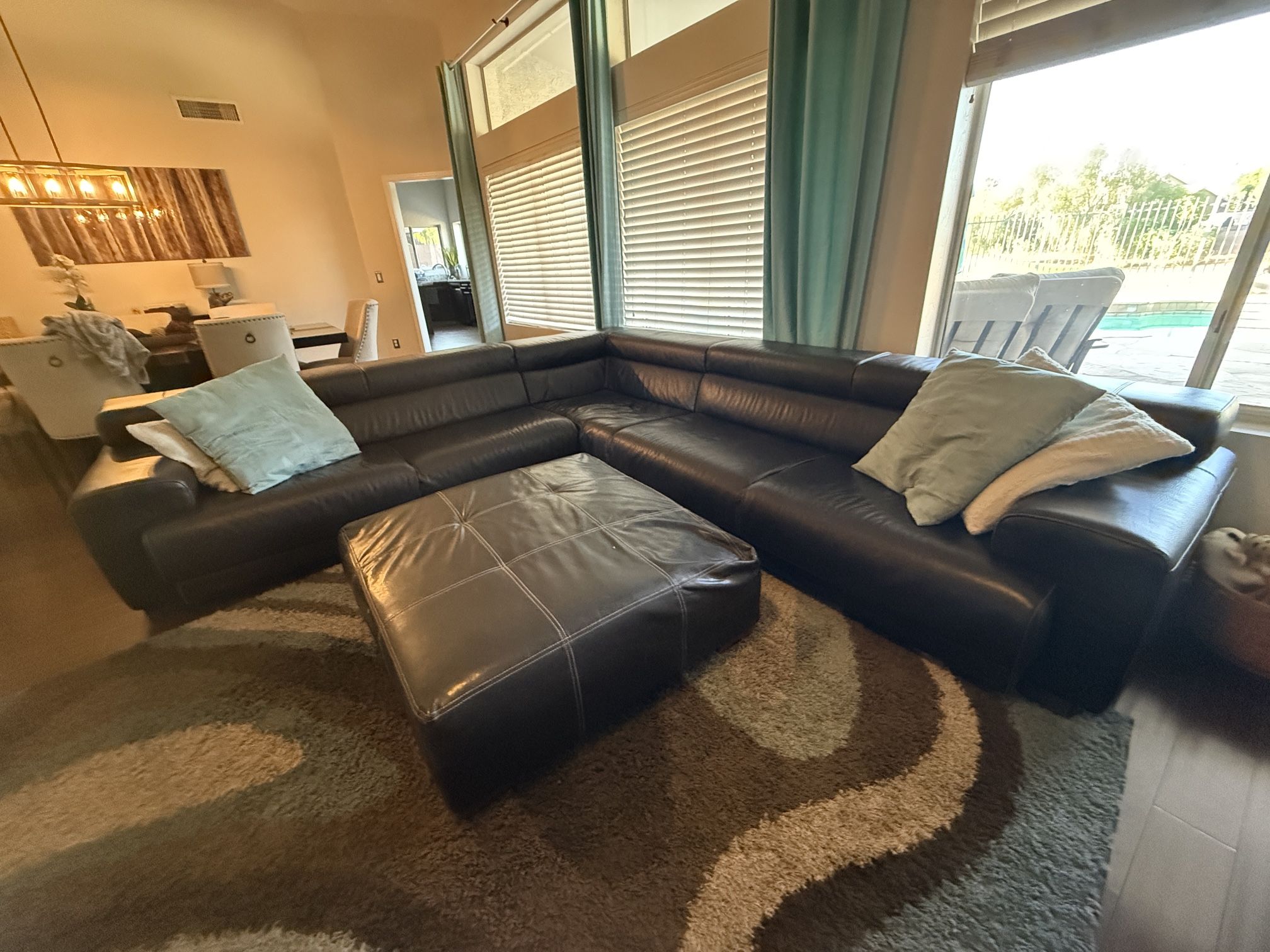 Brown Leather Sectional Sofa & Ottoman – Priced to Sell!