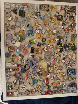 Large Disney Trading Pin Collection on Display Board