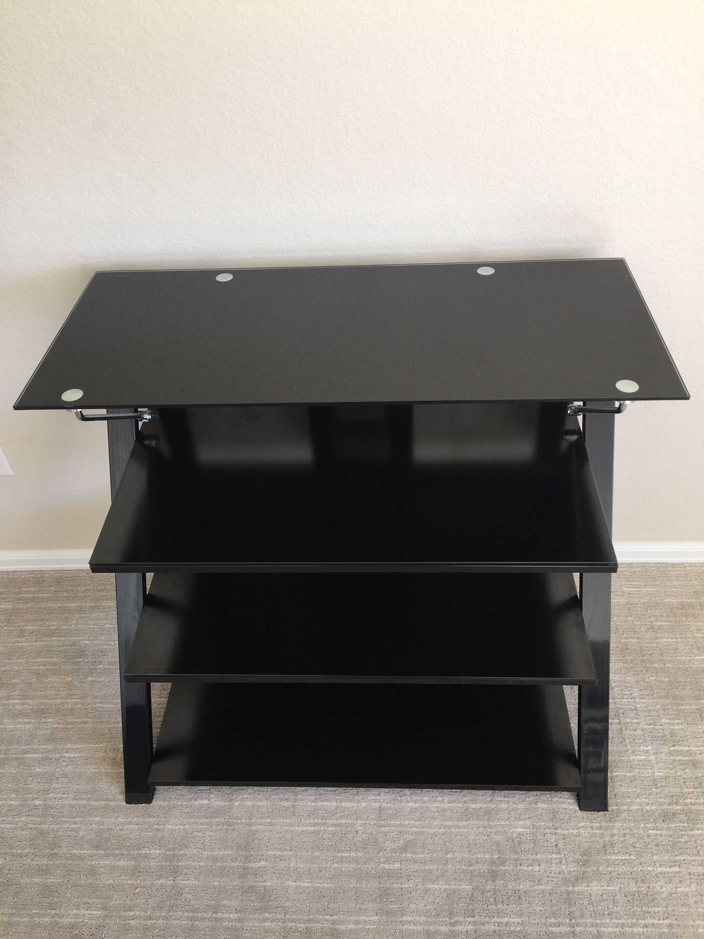 Black tempered glass entertainment stand