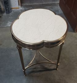 Sagebrook Home metal and marble clover-shaped side table.