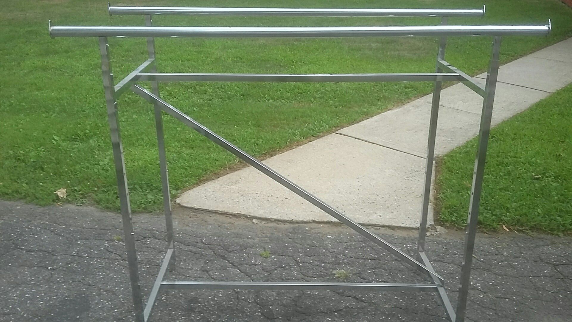 I have two clothes racks adjustable in height $45 each